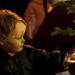 Two-year-old Julia Elkins touches a christmas tree light on Sunday. This was her first experience at the holiday tree lighting ceremony. Daniel Brenner I AnnArbor.com